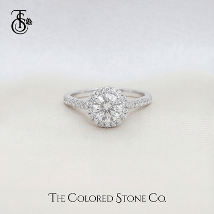 white gold Diamond engagement ring with 'The Colored Stone Co.' branding on a light background